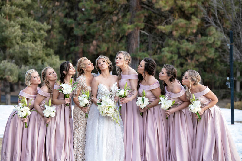Redwood Wedding Photographer with bride and bridesmaids at winter resort wedding