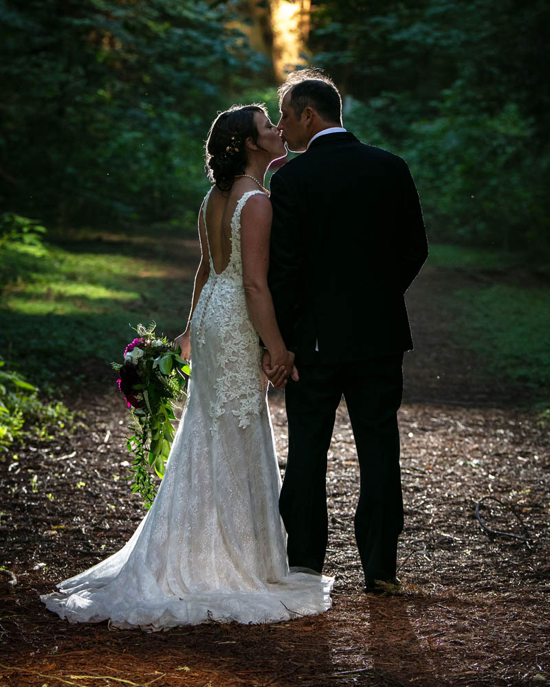 Redwood Wedding Photographer with couple among ferns and redwoods